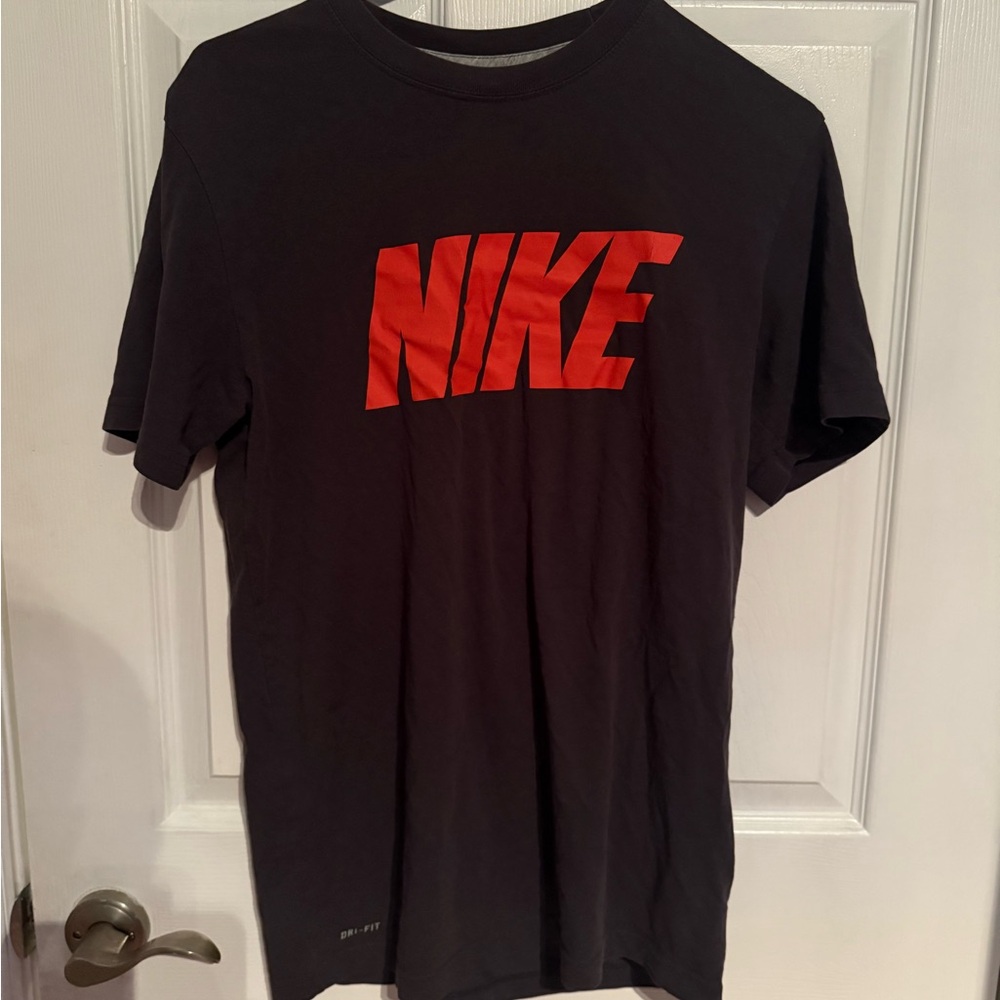 Nike Men's Black Tee with Orange Logo